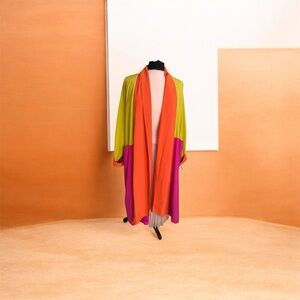 Custom made By Zetta Raincoat in multi color one size. Coat of many colors!